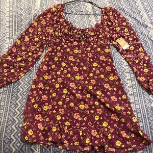 Long sleeve floral dress. Never worn.
